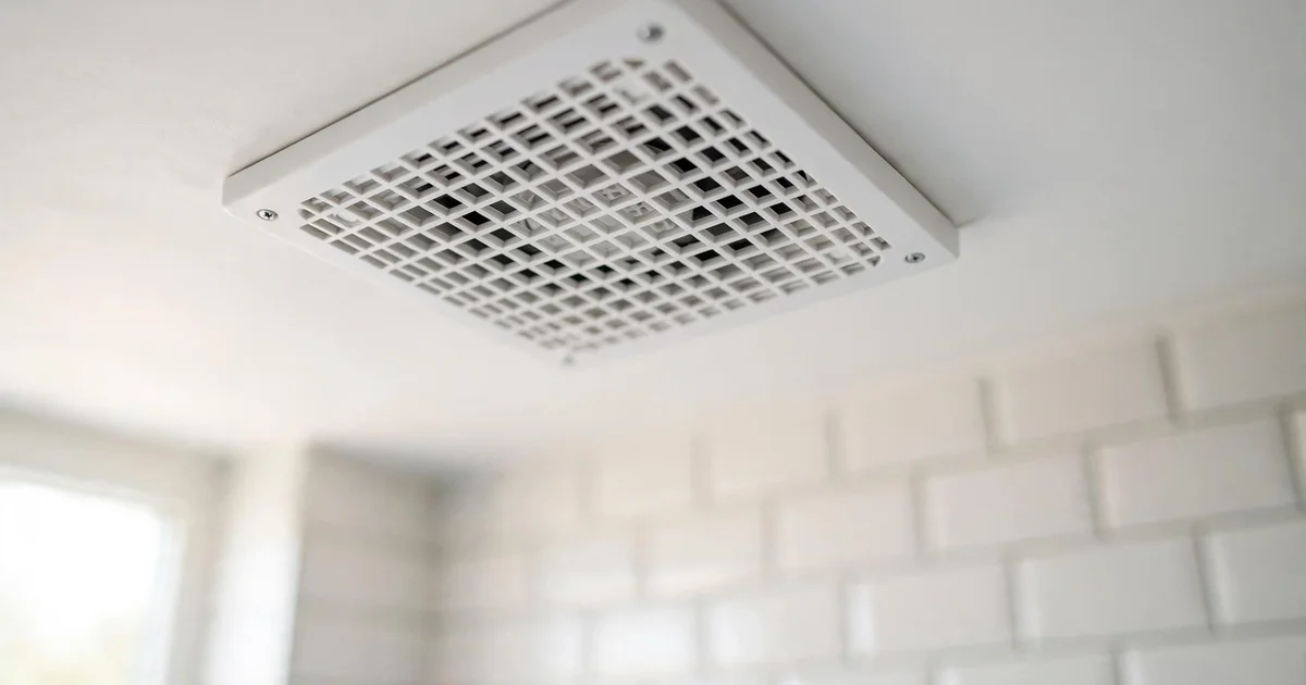 Ceiling exhaust fan grille detail in a San Jose bathroom remodel